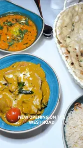 Excited diners enjoying flavorful Indian dishes at Curry Leaf, a new spot on West Road in Newcastle.
