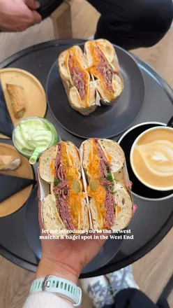 Delicious bagels, matcha drinks, and cannoli at SICK COFFEE, West End's cutest café.