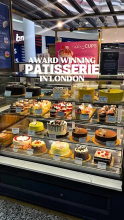 Alt text: "Delicious desserts at Heriots: strawberry gateau, mini cakes, and vibrant macarons in Harrow.