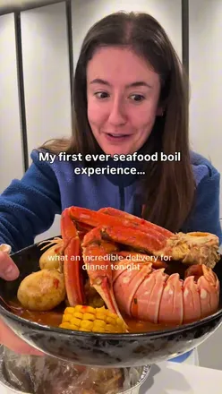 Delicious seafood boil from Proper Grubb in Yate, featuring prawns, crab, and creamy mac & cheese.