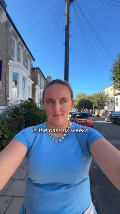 Person reflecting on challenges and growth, sharing thoughts on grief and mental health during a serene moment.