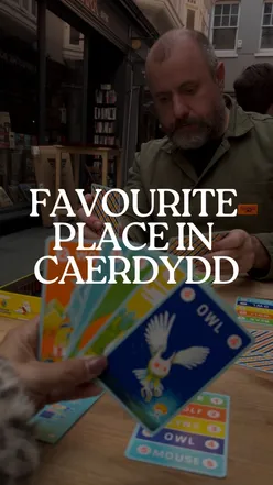 Snapshot of Cardiff's Castle Quarter Arcades filled with vibrant art, games, and events celebrating 70 years as the capital.