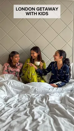 Mum and two daughters enjoying a staycation at a London hotel, exploring, relaxing, and creating memories together.