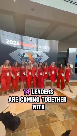 Excited team members promoting the Fast Track to Freedom bootcamp for independent travel agents this holiday season.