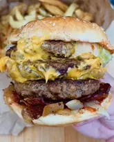 Five Guys takeaway featuring a triple burger and delicious fries, showcasing burger love. ❤️🍔 #FiveGuys #BurgerFan
