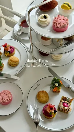 Elegant tea room at Mariage Frères in Covent Garden, featuring an extensive selection of teas and a refined atmosphere.