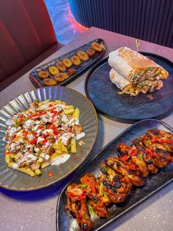 Delicious brunch and cocktails at Peppermint in Manchester, featuring plantain, sticky wings, and chocolate French toast.