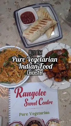 Delicious vegetarian Indian food at Rangolee Sweet Center in Leicester, featuring wraps, paneer, noodles, and chai.