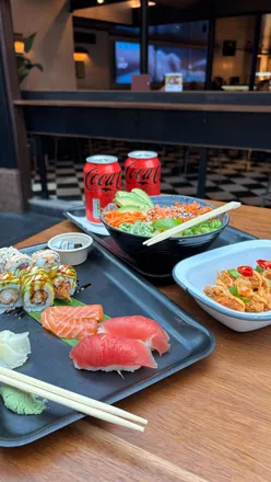 Delicious lunch at Inamo Sushi in Boxhall Food Hall featuring sushi, poke bowl, and fried chicken karaage.