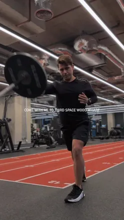 Fitness enthusiasts training at Third Space Wood Wharf, motivated by inspiring club environment.