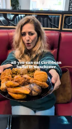 Buffet spread showcasing Caribbean and African dishes at M4 Restaurant in Manchester’s Shudehill.