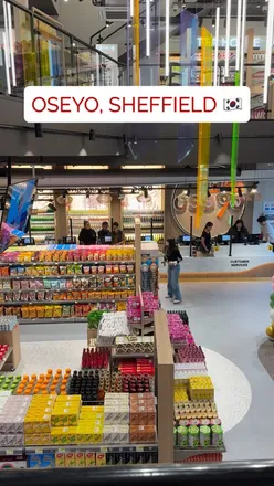 Interior view of Oseyo's flagship Asian supermarket in Sheffield, showcasing vibrant Korean and Japanese food products.