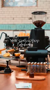 Newly opened Santu Coffee Roasters in Edinburgh, serving Brazilian coffee and offering a cozy seating experience.
