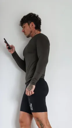 Stylish gym outfits from ASOS showcased by a content creator, highlighting men's fitness fashion and inspiration.