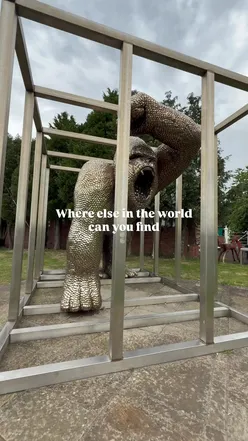 Visitors exploring the British Ironwork Centre's unique sculptures, including the Knife Angel and Spoon Gorilla.