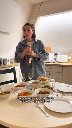 Family enjoying a serene lodge stay with a lake view during a hectic house move, embracing nature's calm.