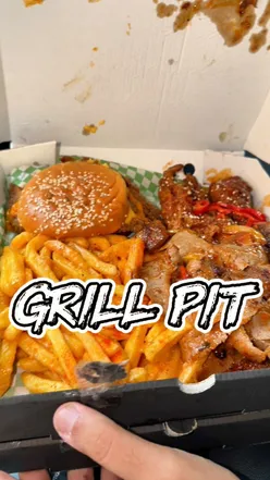 Delicious smash burger at Grill Pit in Rutherglen, featuring an F1 theme and fresh, tasty food.