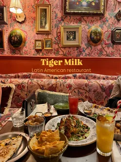 Enjoying vibrant Latin-inspired dishes at Tiger Milk near Tottenham Court Road in central London.