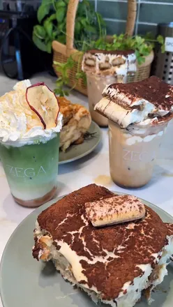 Indulgent tiramisu latte topped with a slice of tiramisu at Zega Coffee, a must-try for dessert lovers in London.