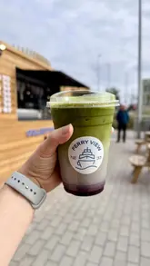 Stasia enjoying Blueberry Matcha and Strawberry Matcha at Ferry View, riverside café in South Shields.