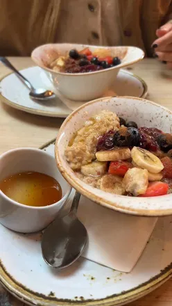 Deliciously creamy porridge with oat milk and honey at Windowbox Cafe, perfect autumn breakfast in Sutton Coldfield.