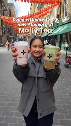 Enjoying pinkity drinkity and jasmine apple milk tea at Molly Tea in London’s Chinatown.