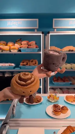 Jellycat Airlines pop-up at Harrods featuring plush toys, collectible boarding passes, and limited-edition cake.