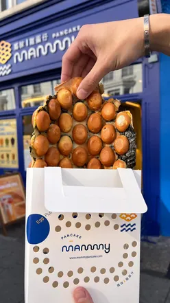 Delicious Hong Kong-style bubble waffles with Earl Grey egg puffs and matcha soft serve at Mammy Pancake, Portobello Road.