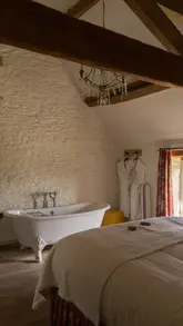 Cozy autumn getaway at Thyme in The Cotswolds, featuring The Dairy cottage, spa, and scenic village strolls.