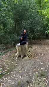 Hiker enjoying the Bluebells Trail at Lickey Hills, embracing nature and fresh air on a bucket list adventure.