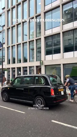 Enjoying a delicious Chipotle Chicken sandwich and coffee at Treelogy, a top cafe in Paddington, London.