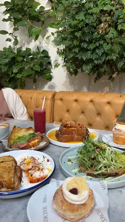Delicious halal breakfast at Medicine Bakery, featuring smoked salmon tartine and fried chicken French toast.