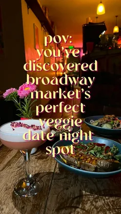 Cozy evening at Aya & Suki, a queer-owned veggie restaurant in Broadway Market, featuring vibrant small plates and cocktails.