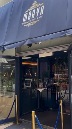 Delicious naan masala pizza topped with chicken tikka, perfect for National Curry Week at Maaya, Milton Keynes.