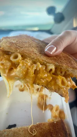 Delicious car picnic featuring The Cheesy Toast Shack's special collab toastie and other tasty varieties.