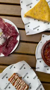 Delicious pintxos and Basque drinks enjoyed outdoors at Pintxito in Covent Garden, capturing the lively tapas bar atmosphere.