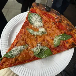 Delicious vodka & chorizo pizza slice with a crispy base at Bambino Dublin, a must-visit for pizza lovers!