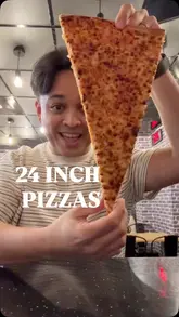 “24-inch pizzas at Pizza Company in Cambridge with foodies, highlighting unique local dining experience.”