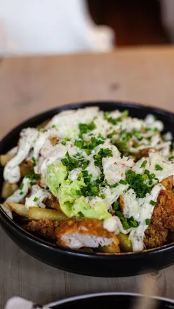 Burger lunch at The Beefy Boys in Cheltenham with friends enjoying delicious food.