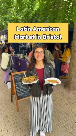 People enjoying diverse Latin American food and festivities at the Broadmead market in Bristol on October 12, 2023.
