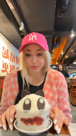 Delicious seafood hotpot at Nan Hotpot in Chinatown, featuring unique desserts like Panda Shaved Ice and Sesame Tapioca.