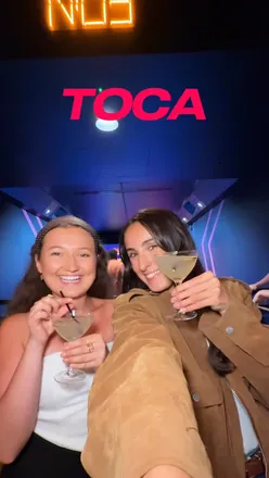 Fun night at Toca Social in Birmingham with football games, cocktails, and delicious food—perfect for friends and family!