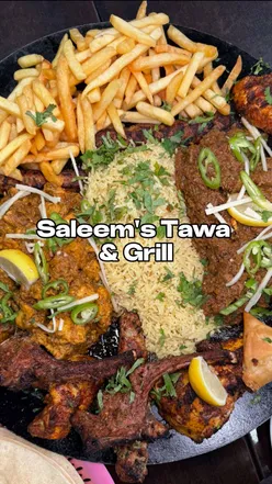 Sharing a flavorful tawa feast with smoky lamb chops, spiced seekh kebabs, and rich karahi at Saleem's Tawa & Grill, Manchester.