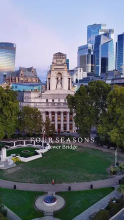 Night view of Tower Bridge and the Shard, showcasing the beauty of London with city lights and landmarks.
