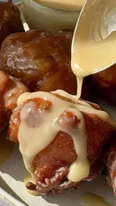 Golden crispy applesauce fritters coated in spiced cinnamon sugar, ready in under 30 minutes for a fall treat.