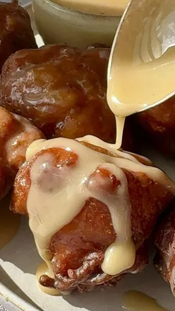 Golden crispy applesauce fritters coated in spiced cinnamon sugar, ready in under 30 minutes for a fall treat.