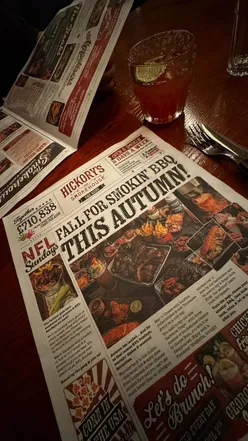 Delicious garlic pretzels, mac & cheese, and brisket at Hickory's Smokehouse in Cardiff, showcasing Deep South flavors.