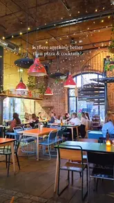 Enjoying pizza and cocktails at Rudy's in Albert Dock, Liverpool, with autumn specials like Triple Cep and Cal-Italia.