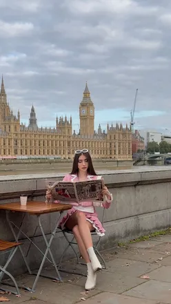 Young woman embracing life in London, reflecting on her journey and growth since moving there four years ago.