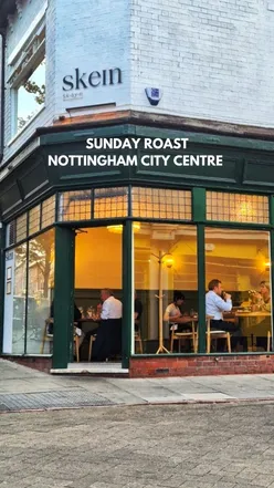 Enjoying a Sunday roast at Skein in Nottingham, featuring chicken, beef, and delightful desserts with friends.